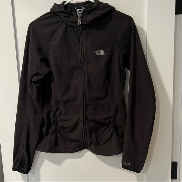 North face Small, embossed pattern, black fleece, front pockets with hood. - Picture 7 of 15